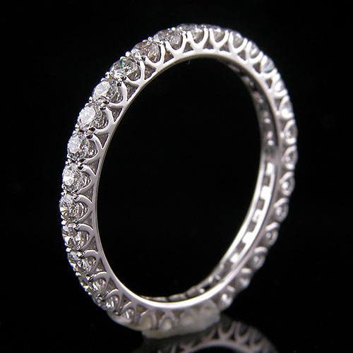 5843-101P Modern common prong-set diamond arched wedding eternity band