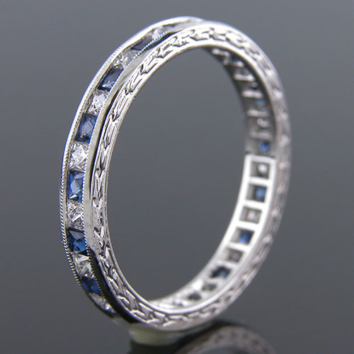 563-442 Antique inspired reproduction French cut sapphire and French cut diamond platinum wedding eternity band