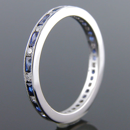 544B-420P Art Deco-inspired French cut sapphire baguette and round diamond platinum wedding eternity band